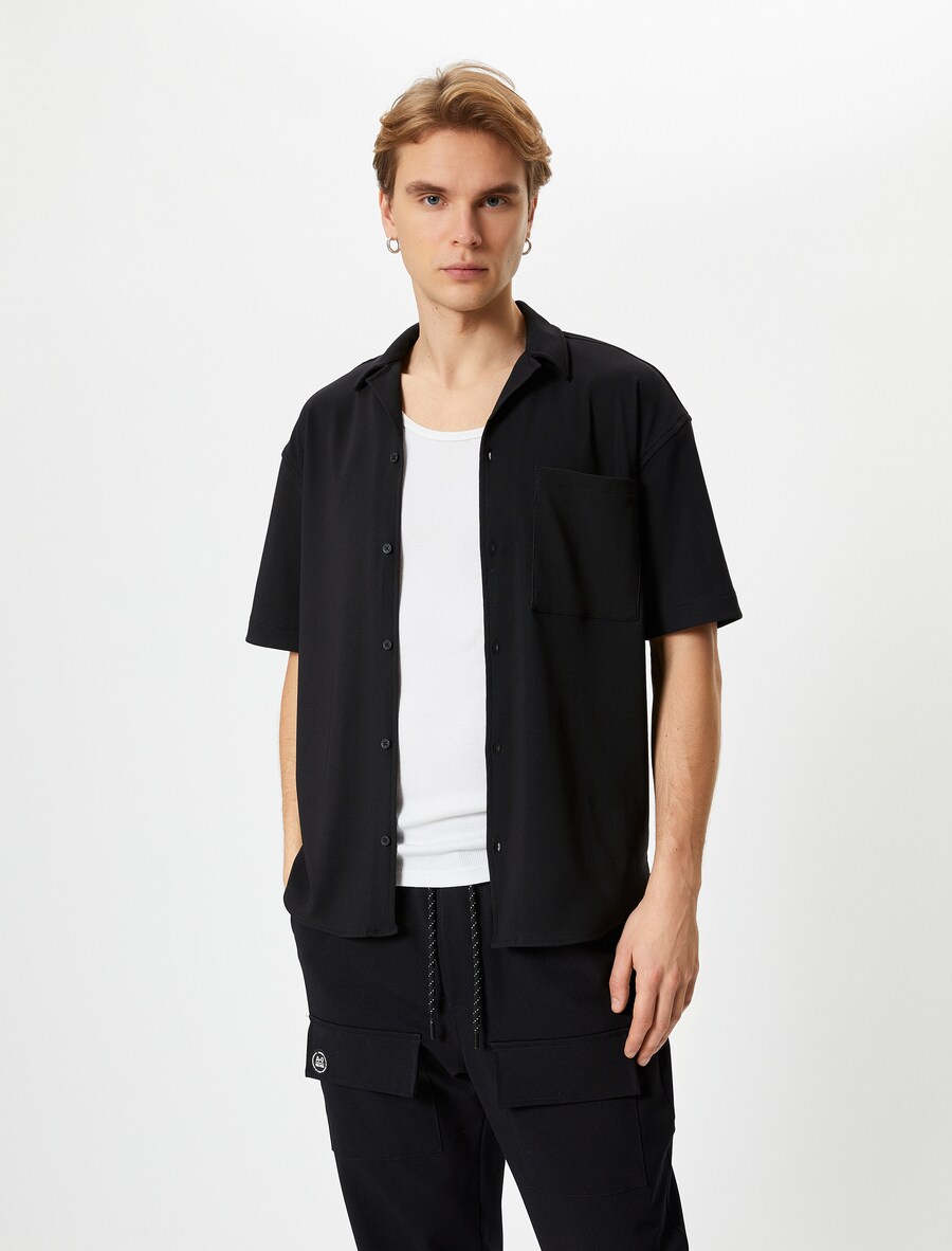 Рубашка на пуговицах классического кроя Koton, черный
Рубашка на пуговицах классического кроя Koton, черный