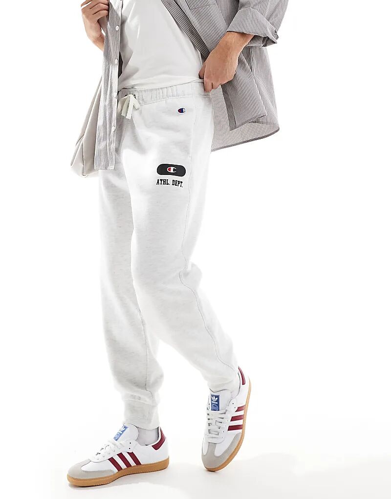 Джоггеры Rochester Collegiate с манжетами из рубчика серого меланжевого цвета Champion
Джоггеры Rochester Collegiate с манжетами из рубчика серого меланжевого цвета Champion