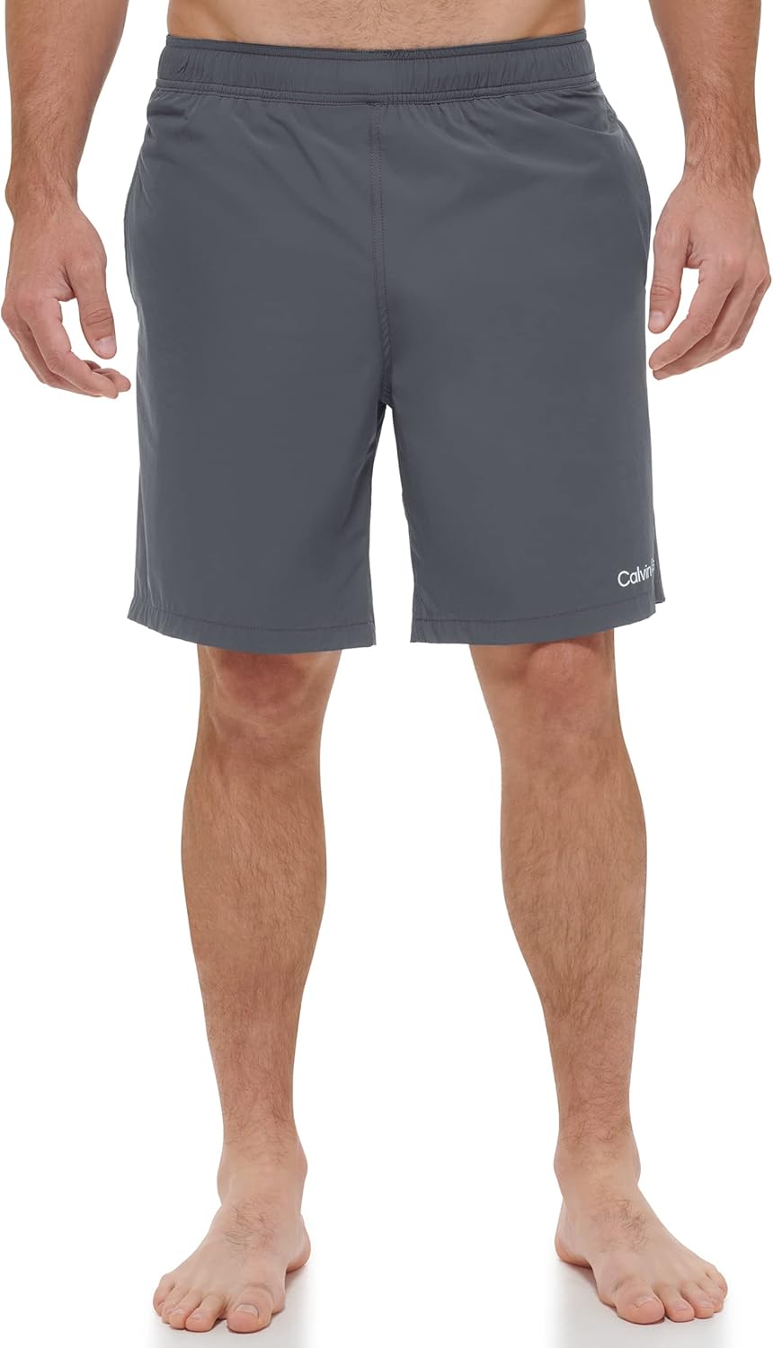 Мужские плавки-шорты Calvin Klein Standard с защитой от ультрафиолета, быстросохнущие, с эластичной резинкой на талии, Grey Logo
Мужские плавки-шорты Calvin Klein Standard с защитой от ультрафиолета, быстросохнущие, с эластичной резинкой на талии, Grey Logo