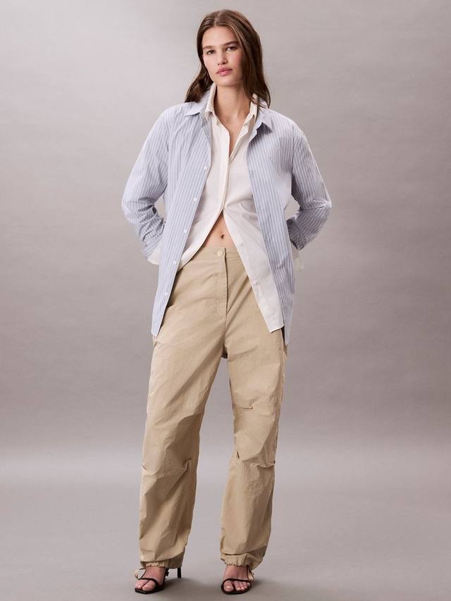 Шуршащие парашютные брюки Calvin Klein, белый
Шуршащие парашютные брюки Calvin Klein, белый