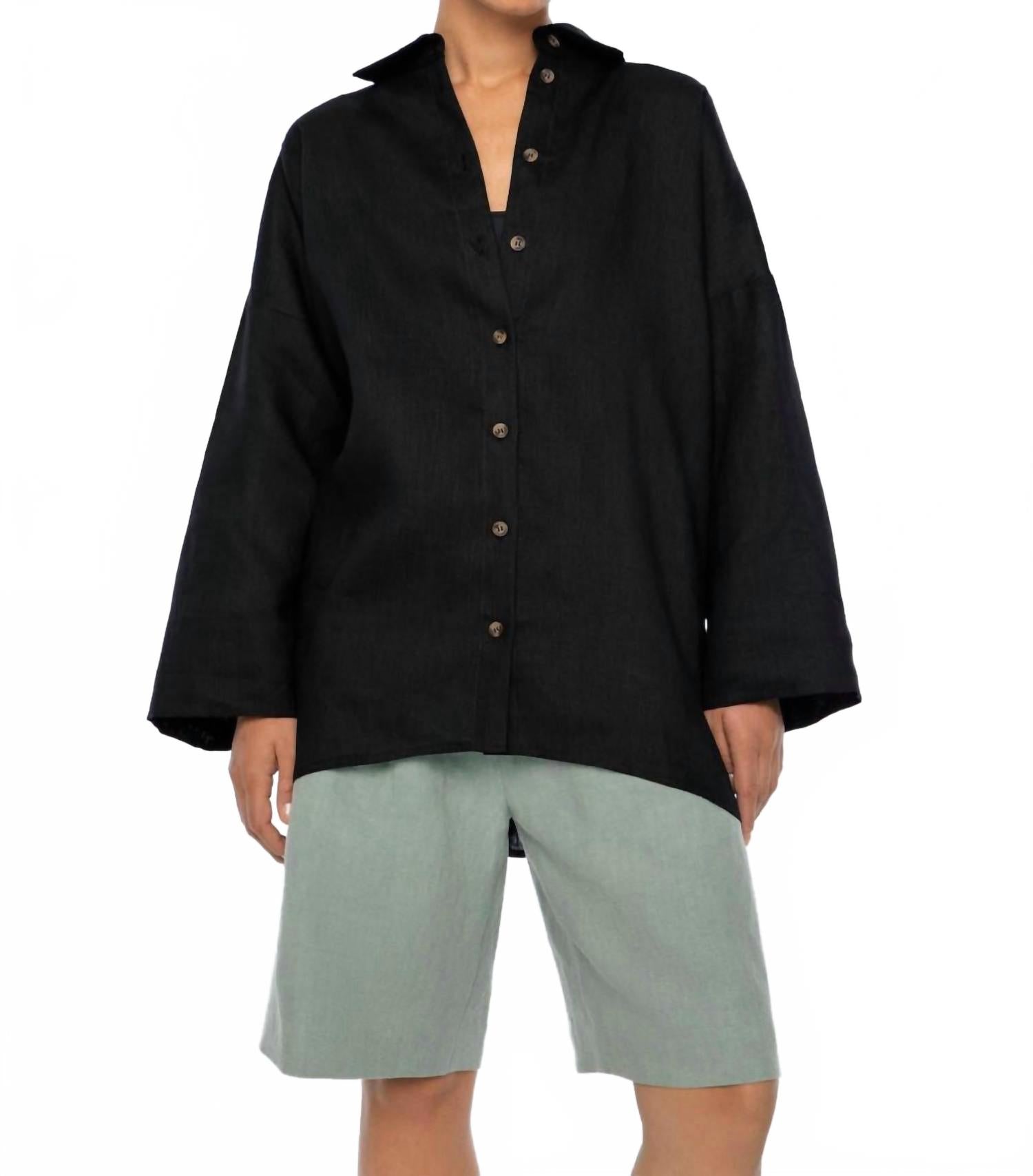 Черная эссенциальная оверсайз рубашка Dāl the Label
Черная эссенциальная оверсайз рубашка Dāl the Label