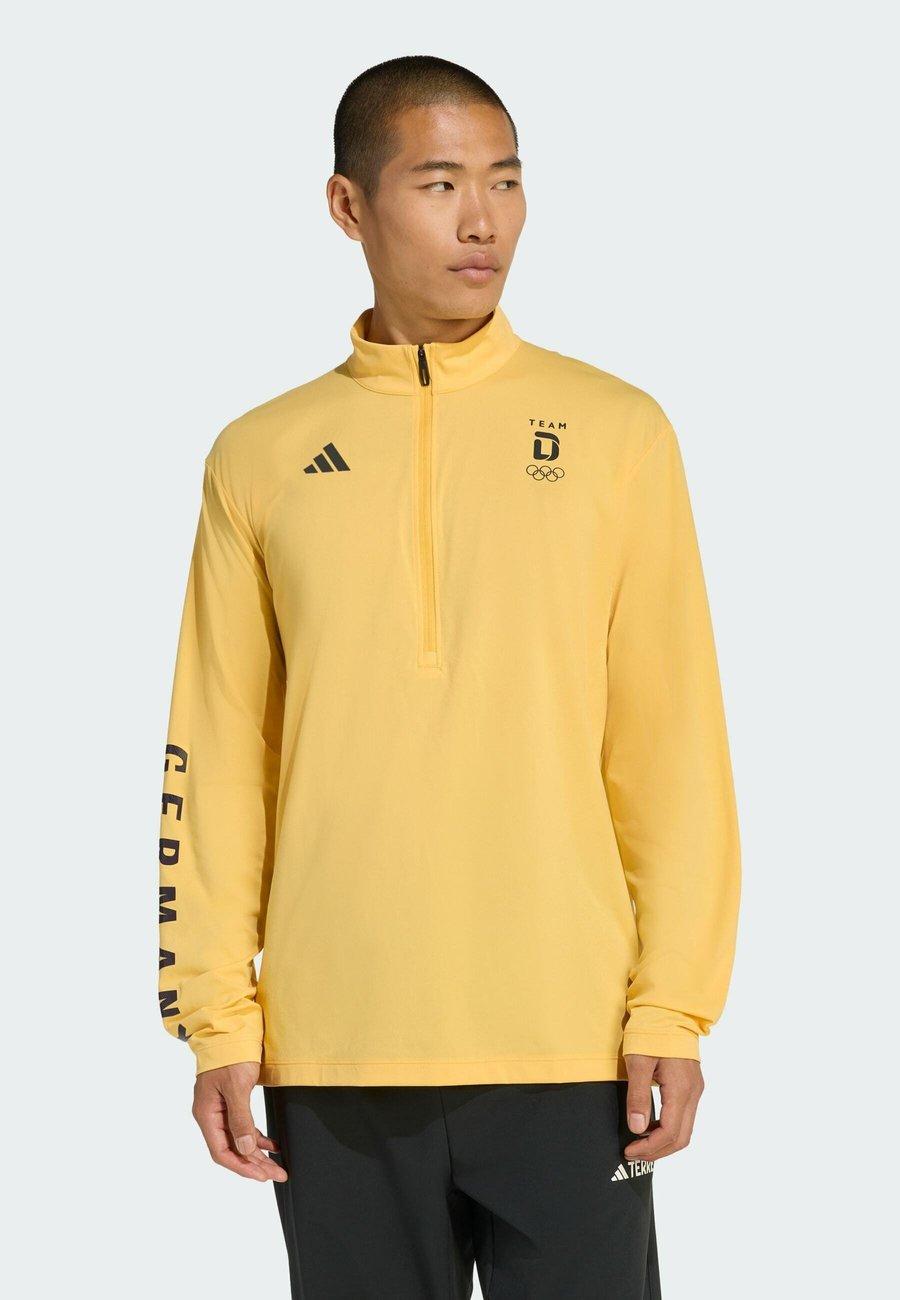 Топ Adidas Performance TEAM D HALF ZIP LONGSLEEVE LIGHT , Semi Spark/Yellow
Топ Adidas Performance TEAM D HALF ZIP LONGSLEEVE LIGHT , Semi Spark/Yellow