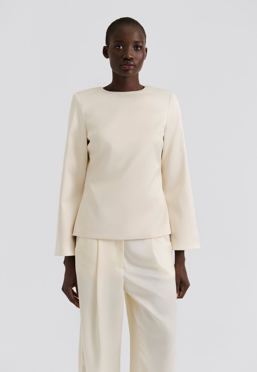 Блуза Malina ELNA BOW, Vanilla/Off-White
Блуза Malina ELNA BOW, Vanilla/Off-White