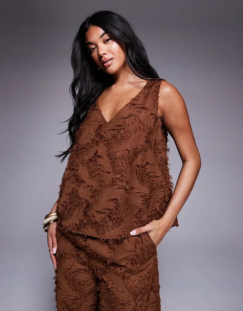 Строгий фактурный топ-клоуз на пуговицах сзади от ASOS DESIGN коричневого цвета
Строгий фактурный топ-клоуз на пуговицах сзади от ASOS DESIGN коричневого цвета