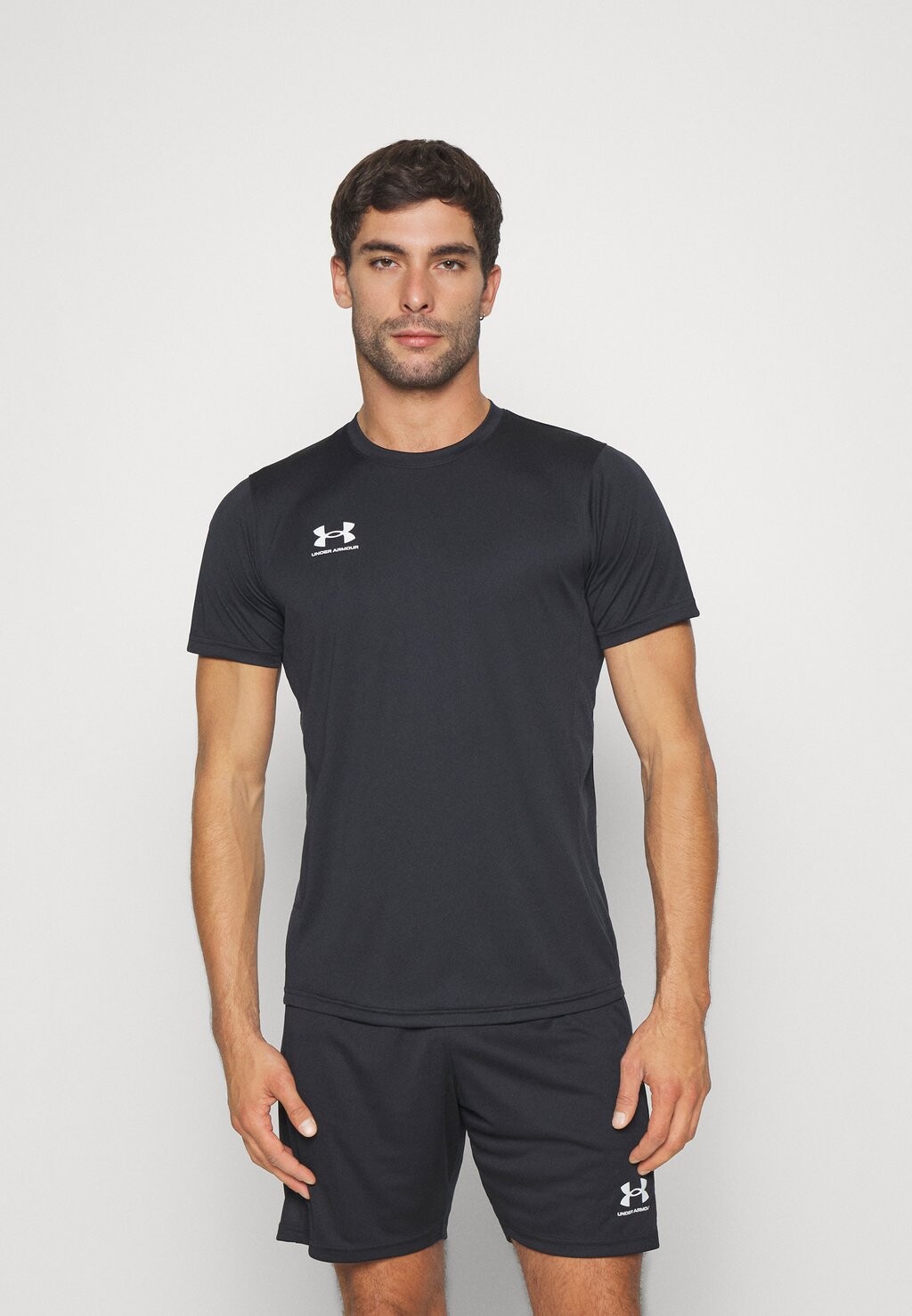 Спортивная футболка CHALLENGER TRAIN Under Armour, черный/белый
Спортивная футболка CHALLENGER TRAIN Under Armour, черный/белый