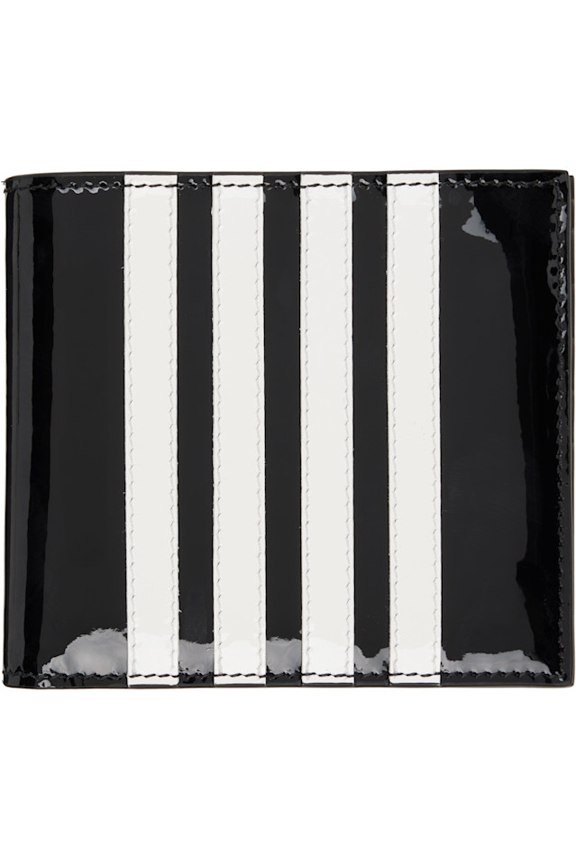 Патентованный складной кошелек с четырьмя перекладинами Thom Browne, черный
Патентованный складной кошелек с четырьмя перекладинами Thom Browne, черный