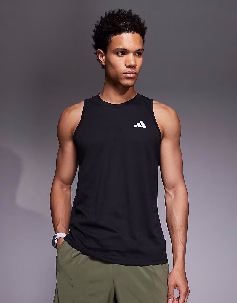 Майка с логотипом adidas Training Essential черного цвета Adidas Performance
Майка с логотипом adidas Training Essential черного цвета Adidas Performance