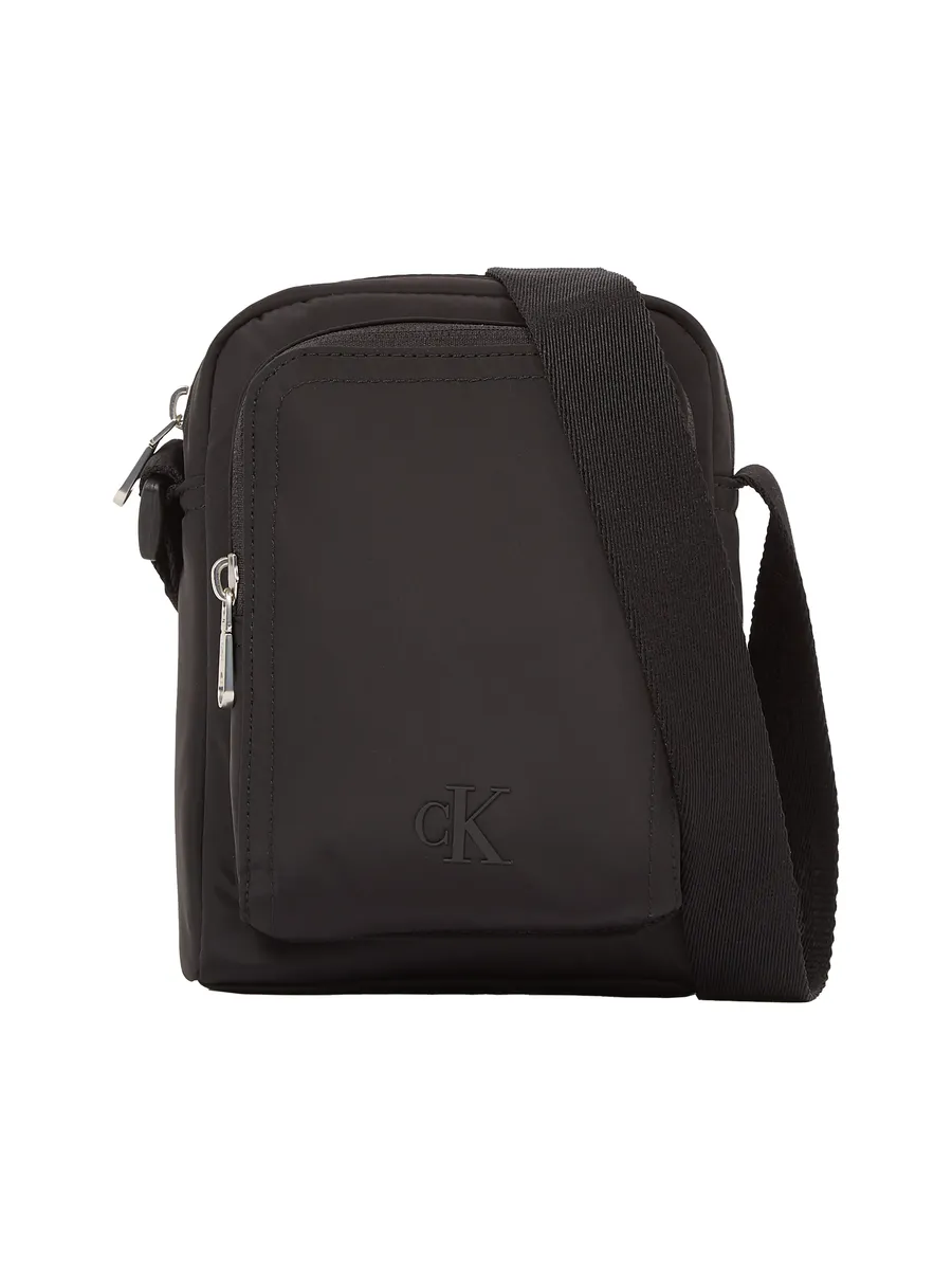 Сумка через плечо Calvin Klein Jeans "OVER WEBBING REPORTER18 NY", черный
Сумка через плечо Calvin Klein Jeans "OVER WEBBING REPORTER18 NY", черный