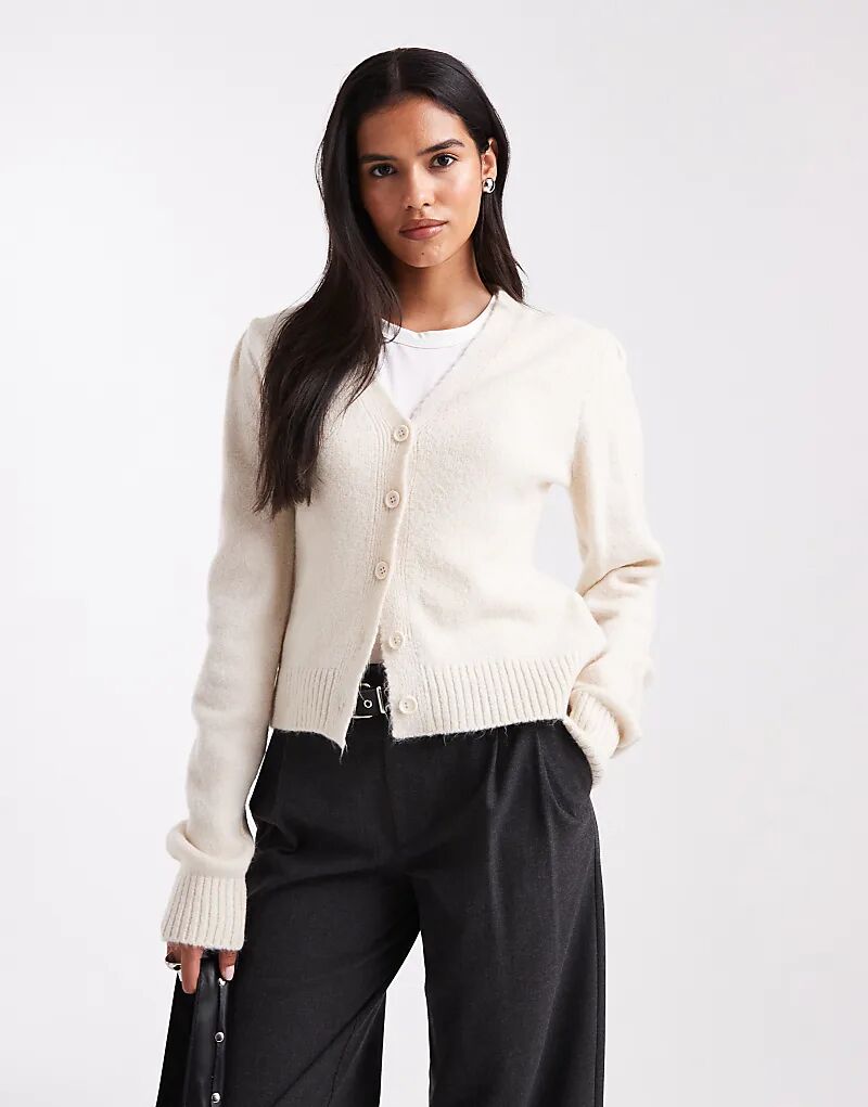 Вязаный кардиган ASOS DESIGN со структурированными рукавами цвета экрю
Вязаный кардиган ASOS DESIGN со структурированными рукавами цвета экрю