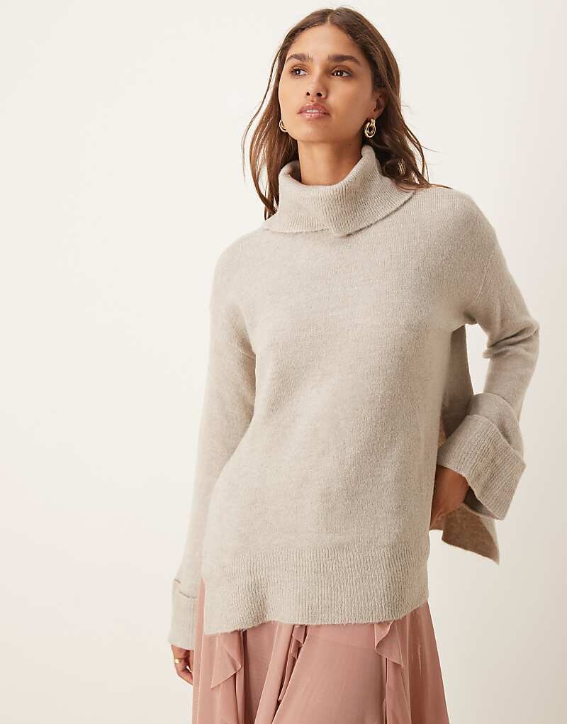 Vila – Голубой мелановый свитер оверсайз с водолазкой и закатанными манжетами
Vila – Голубой мелановый свитер оверсайз с водолазкой и закатанными манжетами