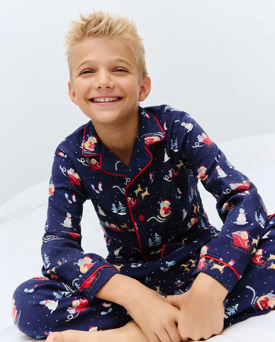 Длинная пижама на пуговицах с рождественским принтом детских санок Cotton Juice, синий
Длинная пижама на пуговицах с рождественским принтом детских санок Cotton Juice, синий