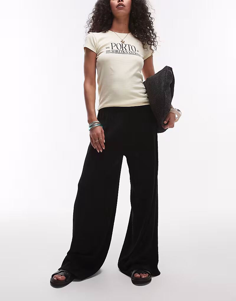 Широкие фактурные брюки Topshop черного цвета
Широкие фактурные брюки Topshop черного цвета