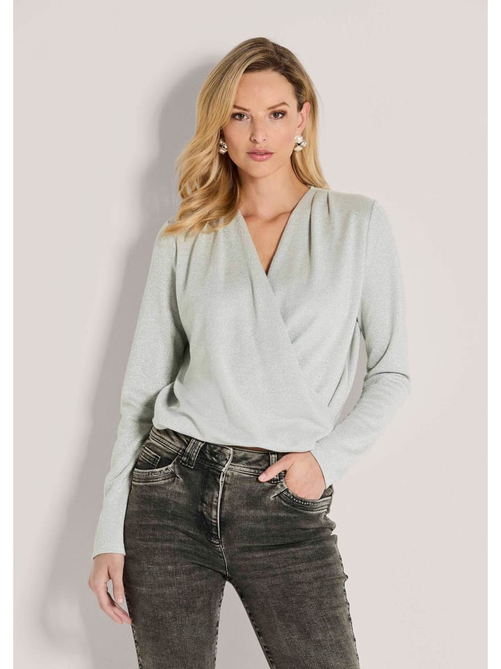 MADELEINE Элегантный топ с запахом, кремово-серебристого цвета
MADELEINE Элегантный топ с запахом, кремово-серебристого цвета