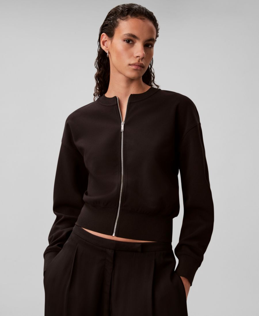 Женский кардиган с круглым вырезом и застежкой-молнией спереди Calvin Klein, Black
Женский кардиган с круглым вырезом и застежкой-молнией спереди Calvin Klein, Black