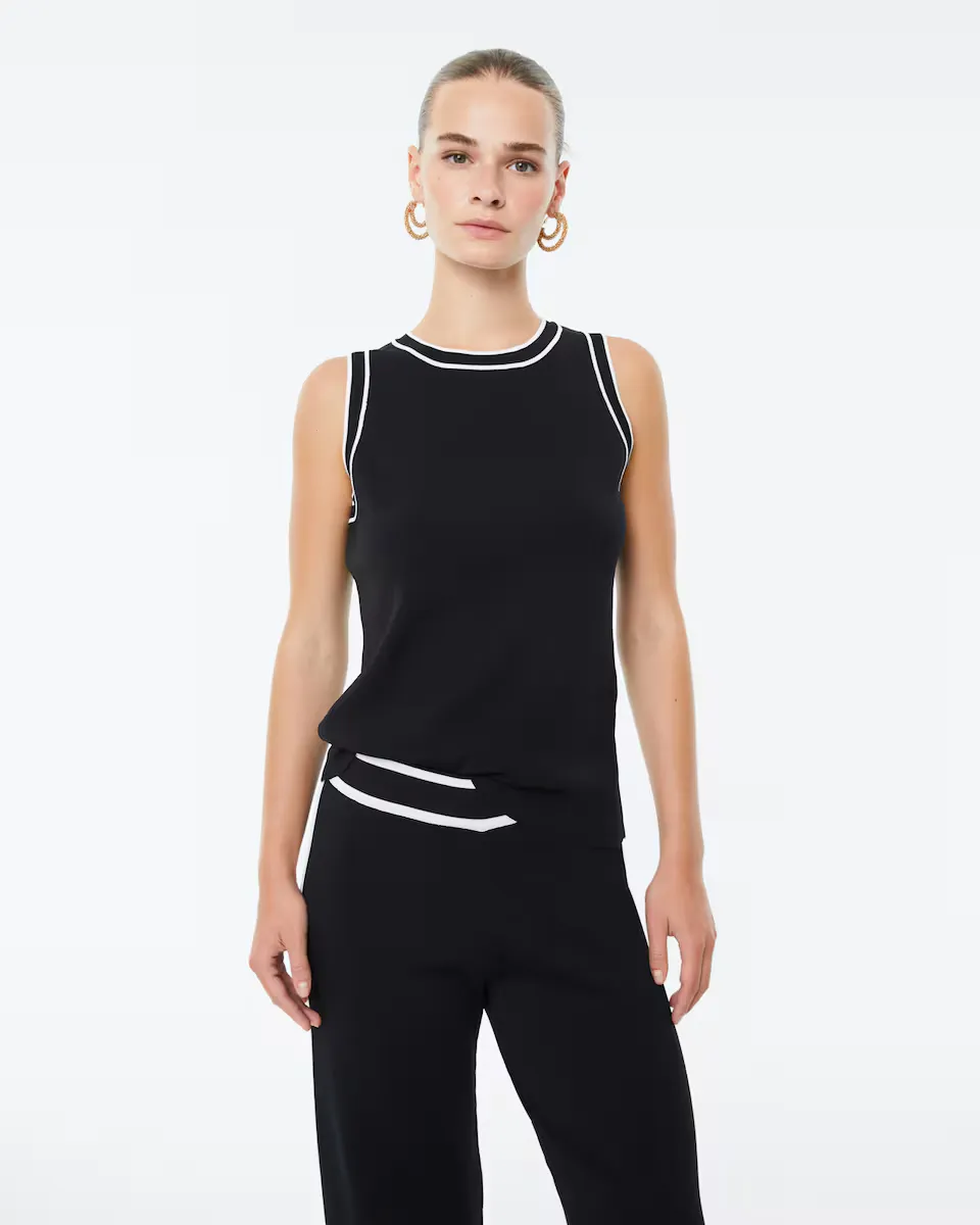 Женский двухцветный трикотажный топ без рукавов Paz Torras, черный
Женский двухцветный трикотажный топ без рукавов Paz Torras, черный