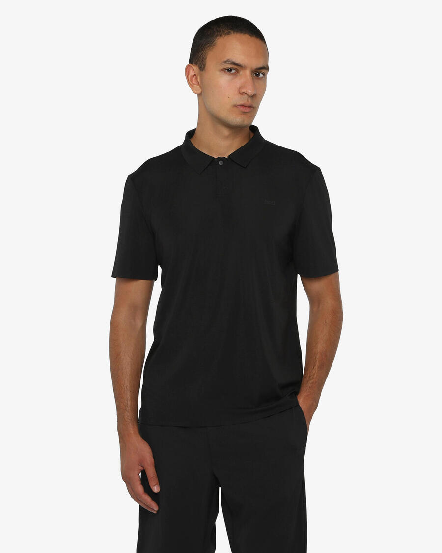 JAKED Черная мужская рубашка-поло из синтетического материала для фитнеса
JAKED Черная мужская рубашка-поло из синтетического материала для фитнеса