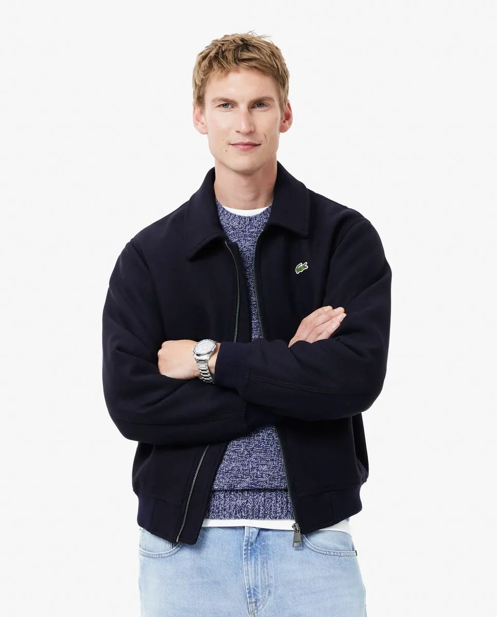 Мужская авиаторская куртка из стеганой шерсти с молнией синего цвета Lacoste
Мужская авиаторская куртка из стеганой шерсти с молнией синего цвета Lacoste