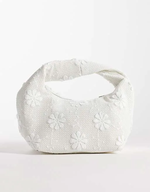 Гламурная плетеная сумка-саквояж с кремовым цветочным принтом
Гламурная плетеная сумка-саквояж с кремовым цветочным принтом