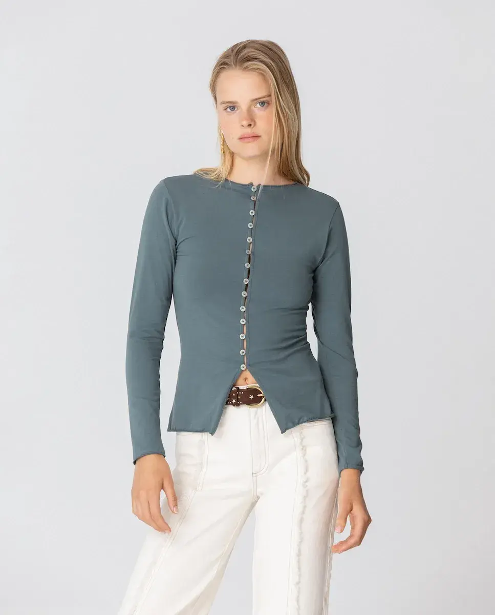 Женский топ с длинными рукавами и пуговицами Noon, темно-зеленый
Женский топ с длинными рукавами и пуговицами Noon, темно-зеленый