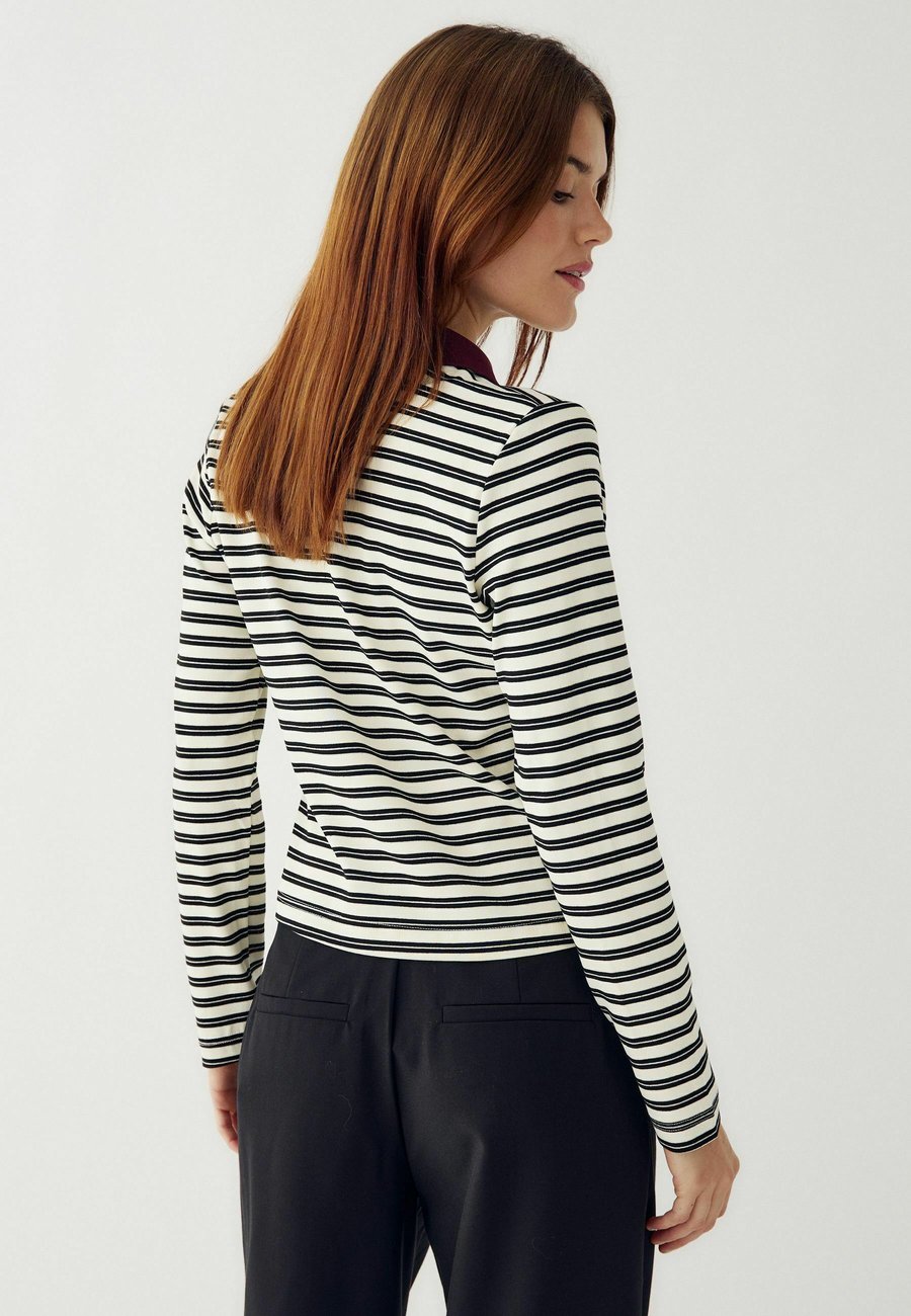 Поло Noella LUANE , Caryll Black Stripe/Beige
Поло Noella LUANE , Caryll Black Stripe/Beige