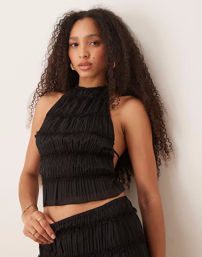 Топ Co-ord с присборенным воротником-халтер черного цвета Gina Tricot
Топ Co-ord с присборенным воротником-халтер черного цвета Gina Tricot