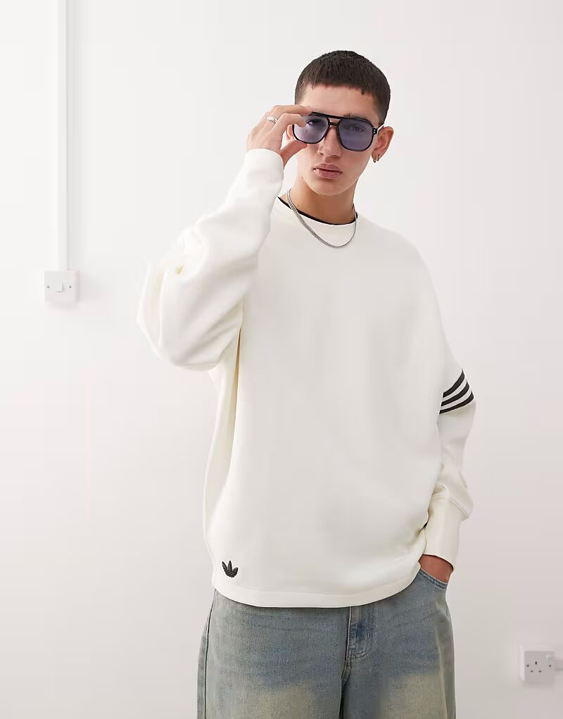 Футболка свободного кроя с длинными рукавами Adidas Originals Neuclassics в цвете «кремовый»
Футболка свободного кроя с длинными рукавами Adidas Originals Neuclassics в цвете «кремовый»