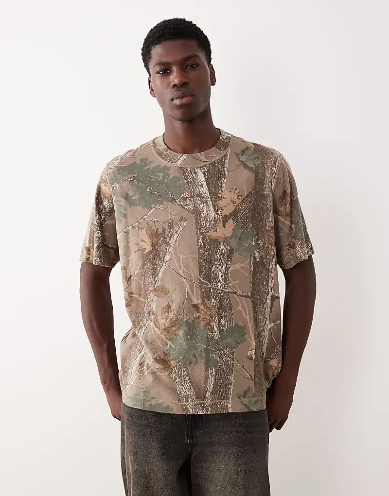 Футболка свободного кроя Abercrombie & Fitch с камуфляжным принтом зеленых листьев
Футболка свободного кроя Abercrombie & Fitch с камуфляжным принтом зеленых листьев