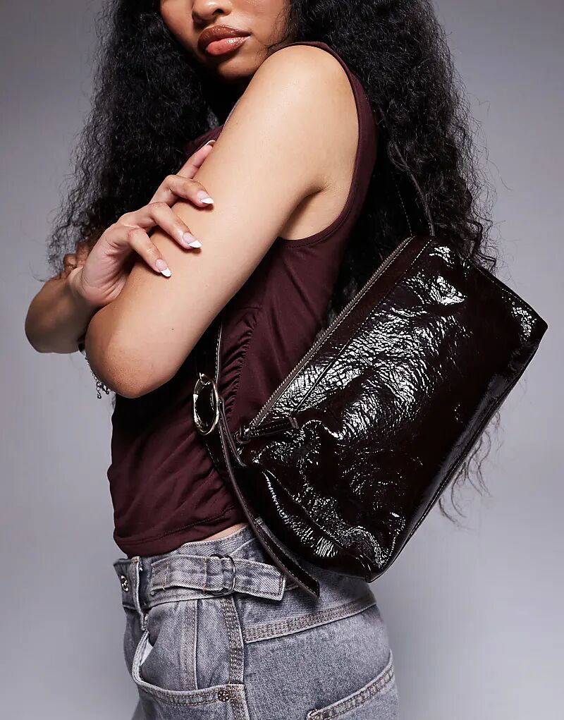 Сумка через плечо River Island из потрескавшейся кожи темно-коричневого цвета
Сумка через плечо River Island из потрескавшейся кожи темно-коричневого цвета