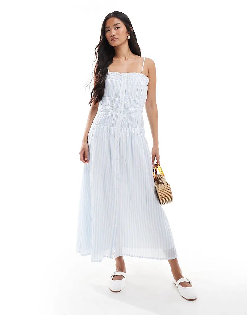 Платье макси Miss Selfridge из поплина с присборенным лифом и застежкой на пуговицы в синюю полоску
Платье макси Miss Selfridge из поплина с присборенным лифом и застежкой на пуговицы в синюю полоску