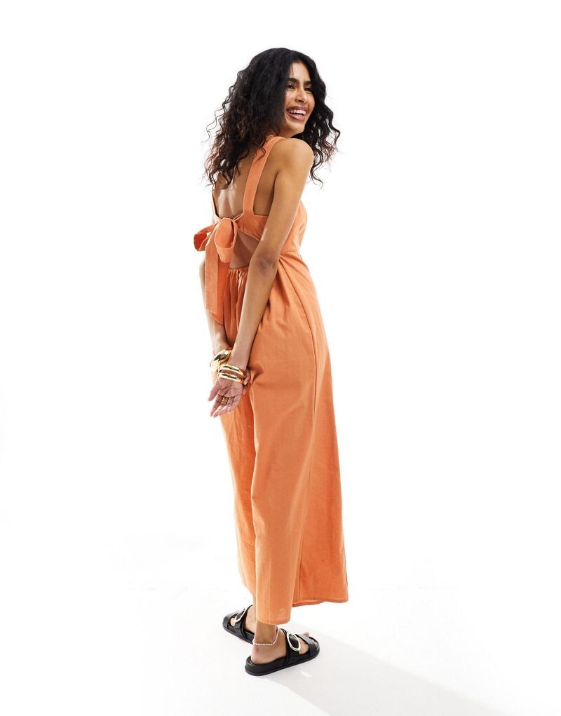 Укороченный льняной комбинезон ржавого цвета с завязками на спине ASOS DESIGN
Укороченный льняной комбинезон ржавого цвета с завязками на спине ASOS DESIGN