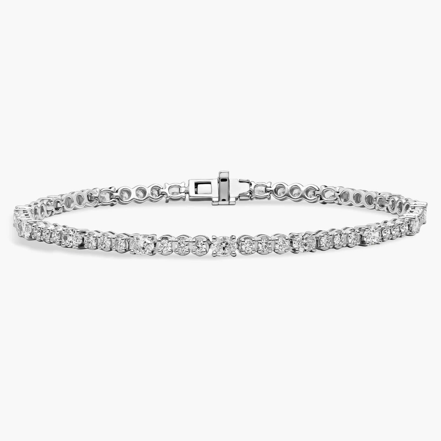 Браслет с овальными и круглыми бриллиантами из 14-каратного белого золота (3 карата) Blue Nile
Браслет с овальными и круглыми бриллиантами из 14-каратного белого золота (3 карата) Blue Nile