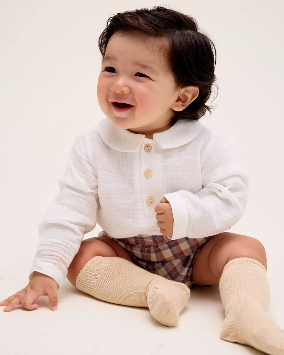 Клетчатые детские шорты Dadati, коричневый
Клетчатые детские шорты Dadati, коричневый