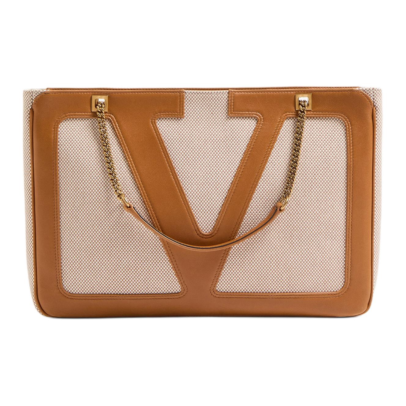 Valentino Гарвани холщовая портативная сумка через плечо среднего размера унисекс натуральная и коричневая
Valentino Гарвани холщовая портативная сумка через плечо среднего размера унисекс натуральная и коричневая