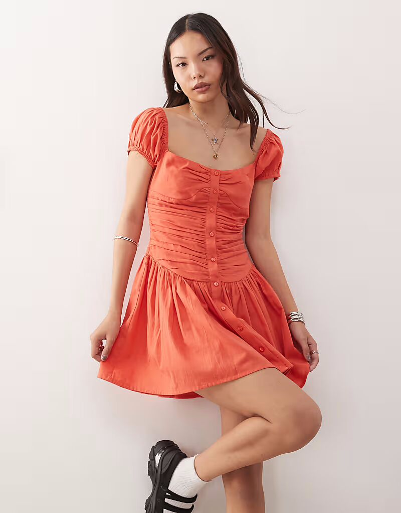 Мини-платье-солнце Reclaimed Vintage с квадратным вырезом и заниженной талией в мандариново-красном цвете
Мини-платье-солнце Reclaimed Vintage с квадратным вырезом и заниженной талией в мандариново-красном цвете