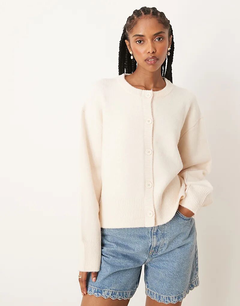 Кардиган свободного кроя с круглым вырезом и разрезами по бокам ASOS DESIGN кремового цвета
Кардиган свободного кроя с круглым вырезом и разрезами по бокам ASOS DESIGN кремового цвета
