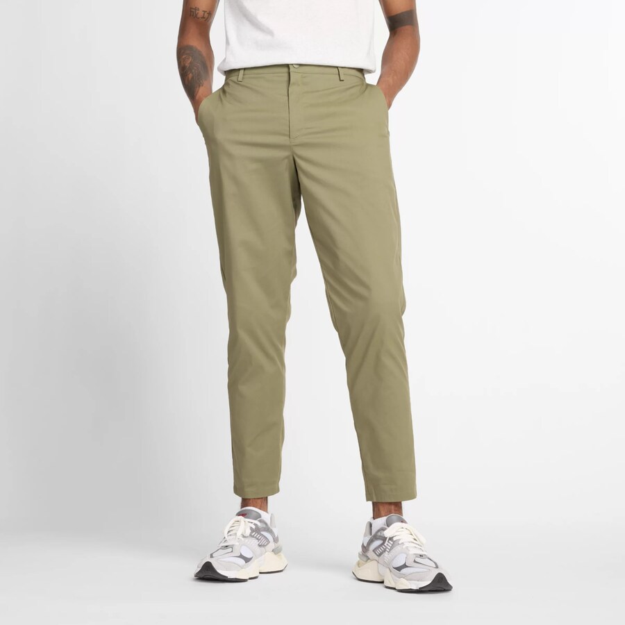 Зауженные брюки new balance, оливковый
Зауженные брюки new balance, оливковый