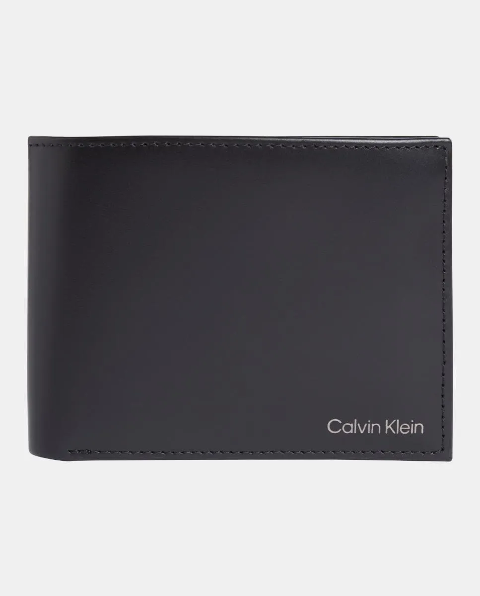 Кожаное тройное портмоне Calvin Klein, черный
Кожаное тройное портмоне Calvin Klein, черный