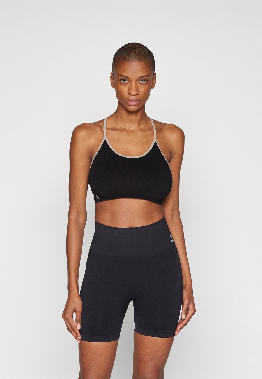 Бюстгальтер Yogasearcher DHARMA SEAMLESS BRA, Black
Бюстгальтер Yogasearcher DHARMA SEAMLESS BRA, Black