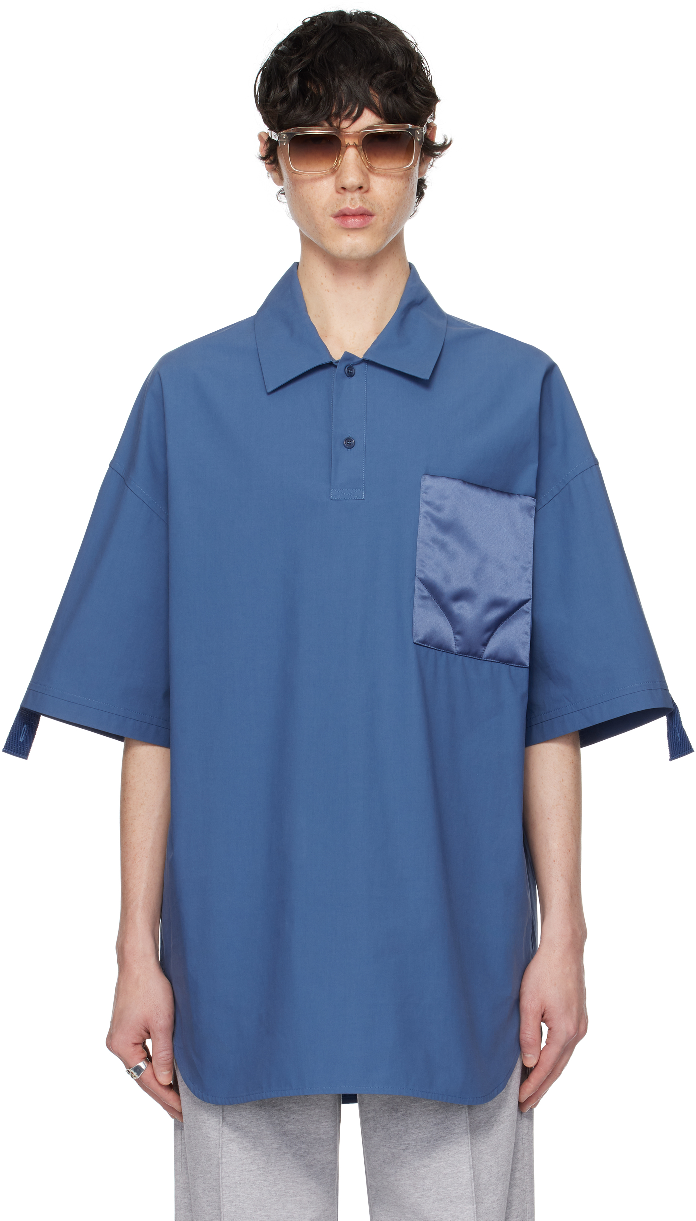 Синее поло со стеганым карманом JW Anderson
Синее поло со стеганым карманом JW Anderson