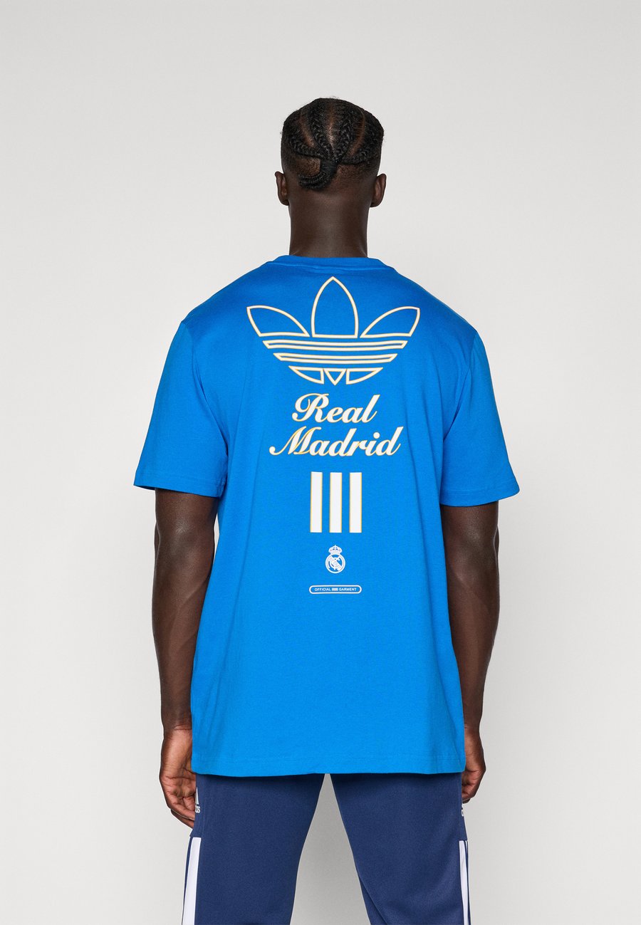 Футболка Adidas Originals REAL MADRID ICON GRAPHIC T-SHIRT, Bluebird/Blue
Футболка Adidas Originals REAL MADRID ICON GRAPHIC T-SHIRT, Bluebird/Blue