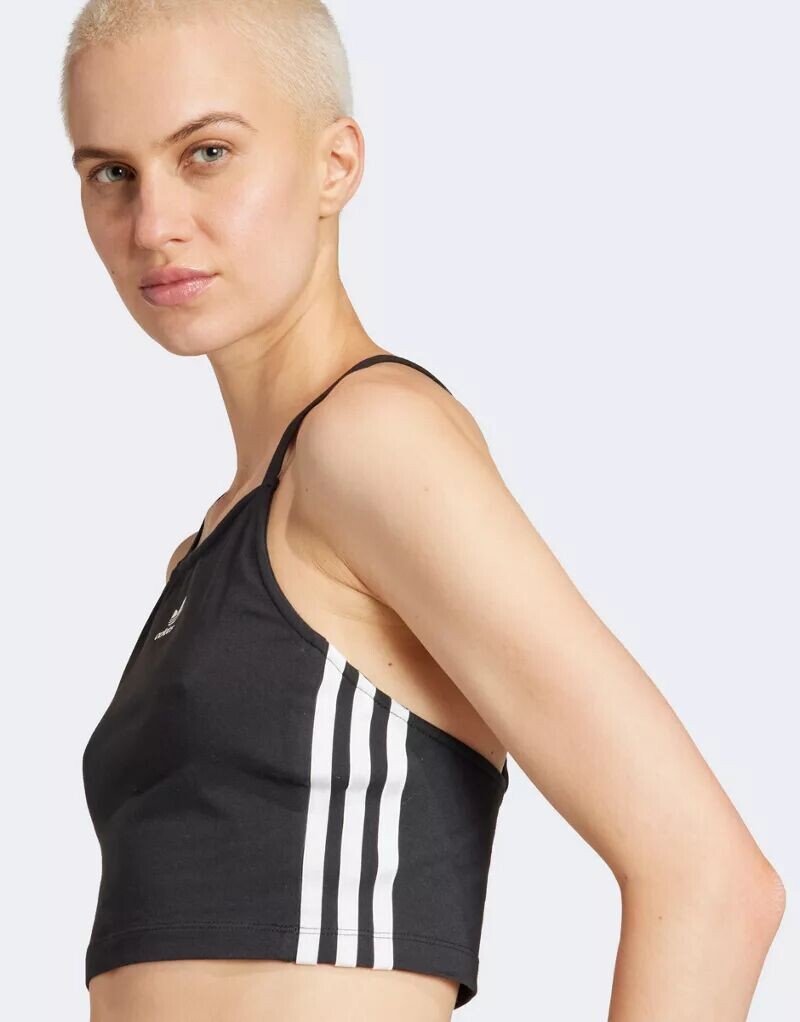 Черный укороченный топ с длинными рукавами и тремя полосками adidas Adicolor adidas Originals
Черный укороченный топ с длинными рукавами и тремя полосками adidas Adicolor adidas Originals