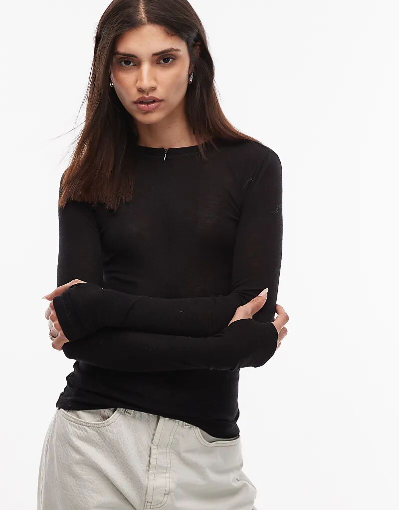 Вязаный полупрозрачный топ ARKET из мериносовой шерсти с минималистичным вырезом на молнии, черный цвет
Вязаный полупрозрачный топ ARKET из мериносовой шерсти с минималистичным вырезом на молнии, черный цвет