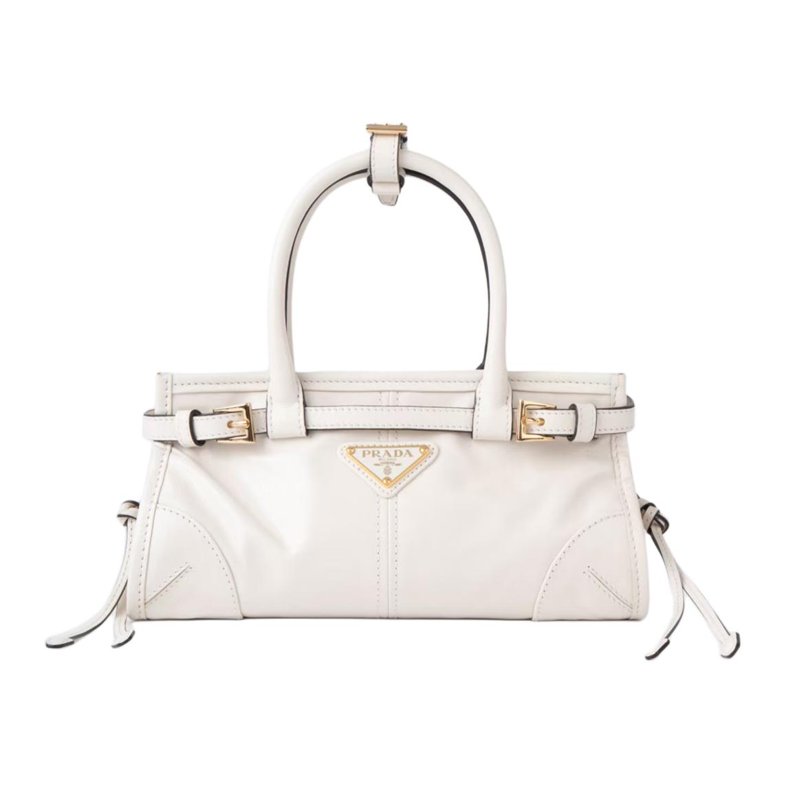 PRADA Миниатюрная женская сумка из коровьей кожи белого цвета
PRADA Миниатюрная женская сумка из коровьей кожи белого цвета