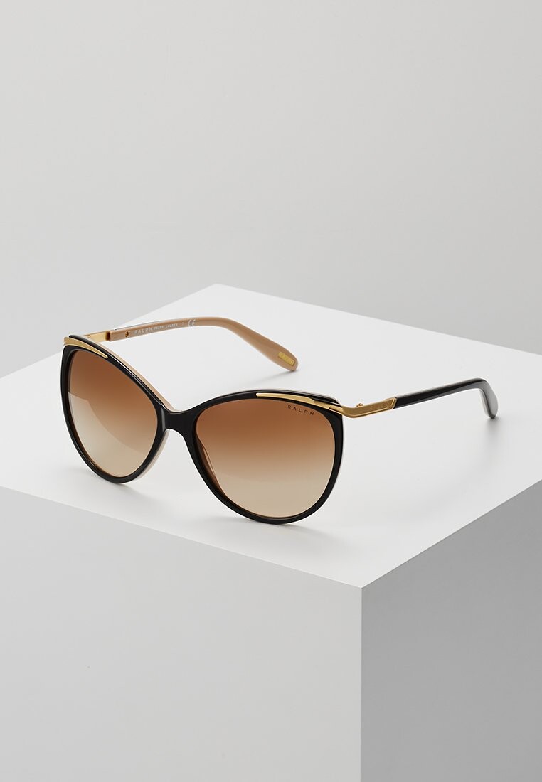 Солнцезащитные очки Ralph Lauren
Солнцезащитные очки Ralph Lauren