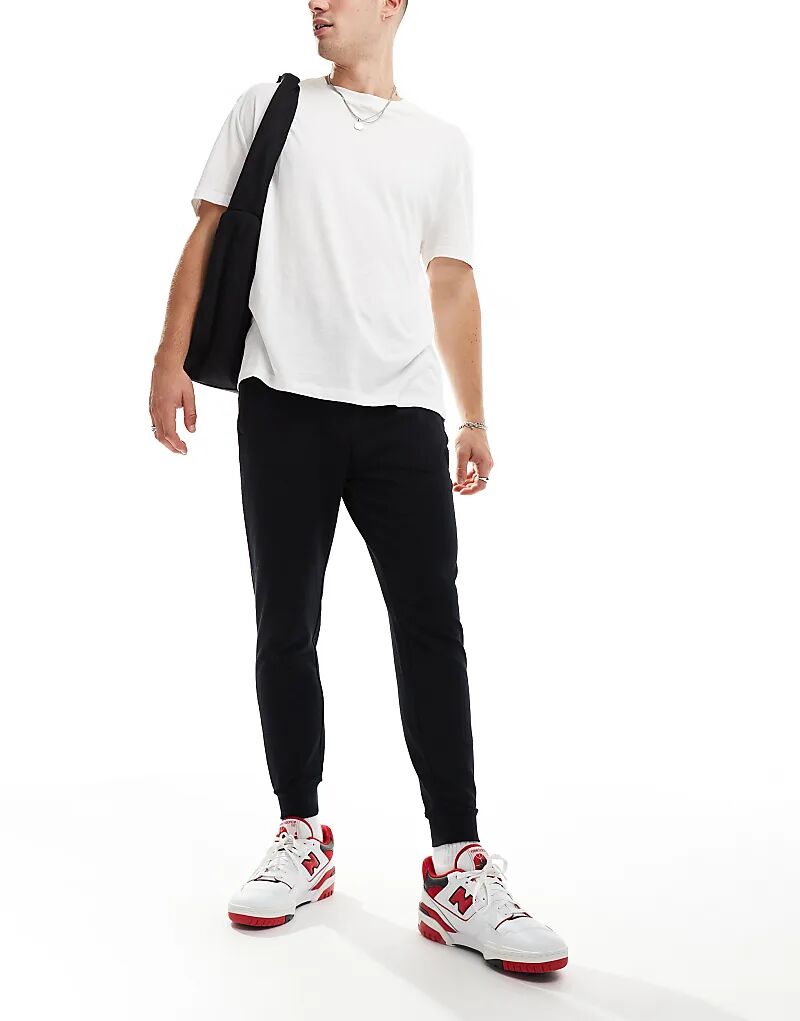 Зауженные спортивные брюки Focus черного цвета Hera
Зауженные спортивные брюки Focus черного цвета Hera