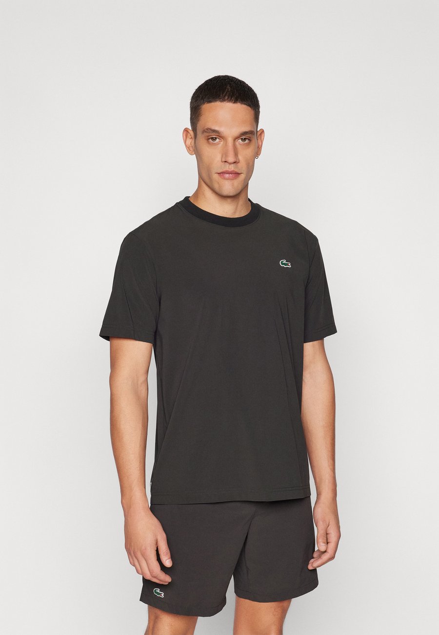 Спортивная футболка Lacoste Sport ACTIVE, Black
Спортивная футболка Lacoste Sport ACTIVE, Black