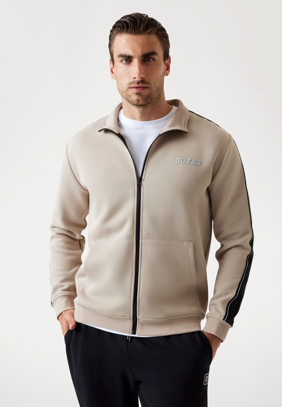 Толстовка Guess MIT SEITLICHEM LOGO, Beige
Толстовка Guess MIT SEITLICHEM LOGO, Beige