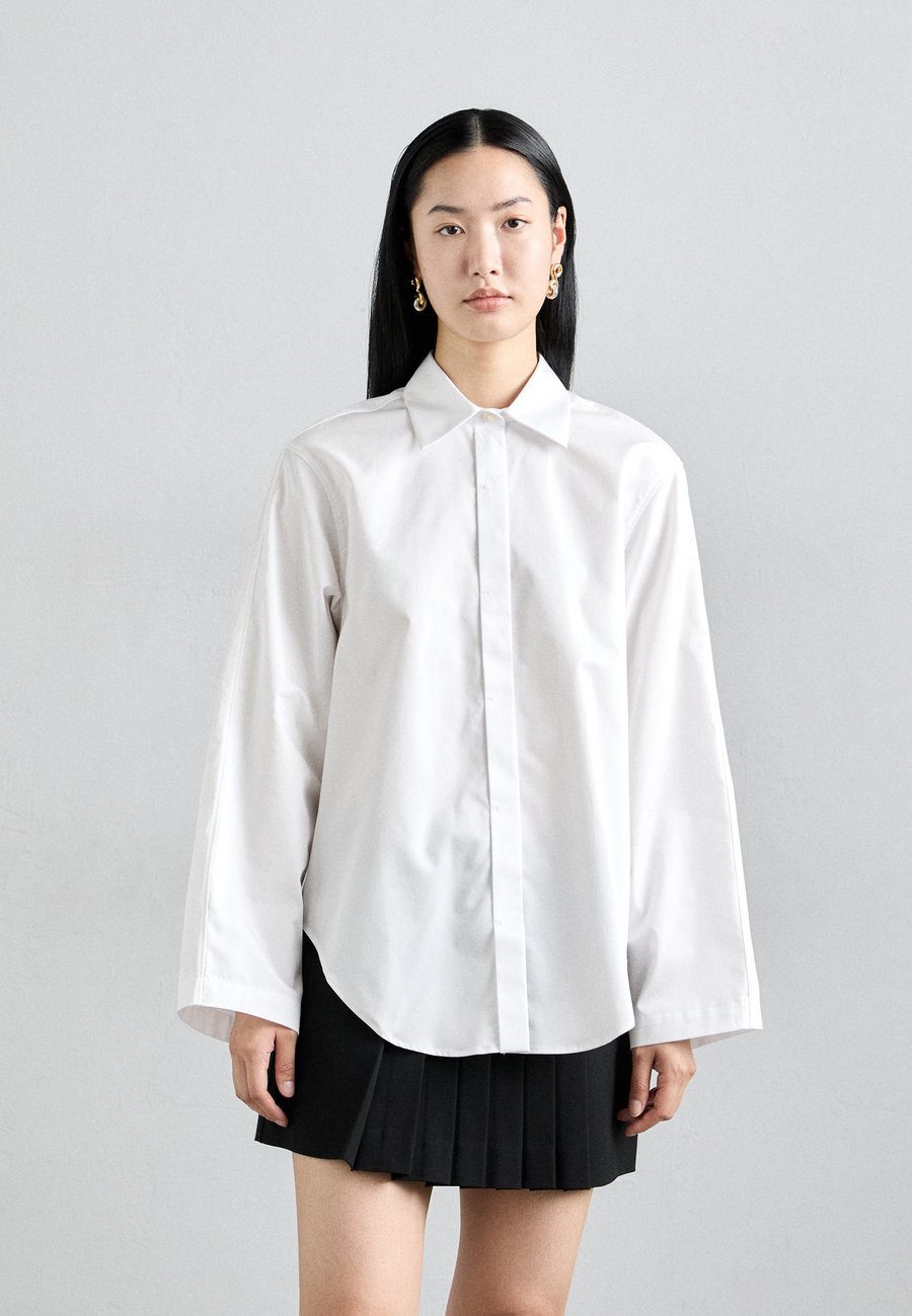 Блуза Tiger of Sweden CORNIA, Pure White/White
Блуза Tiger of Sweden CORNIA, Pure White/White