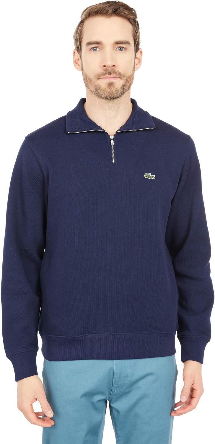 Мужская однотонная толстовка с длинным рукавом и застежкой-молнией 1/4 из трикотажного полотна с отделкой в рубчик Lacoste, Navy Blue
Мужская однотонная толстовка с длинным рукавом и застежкой-молнией 1/4 из трикотажного полотна с отделкой в рубчик Lacoste, Navy Blue