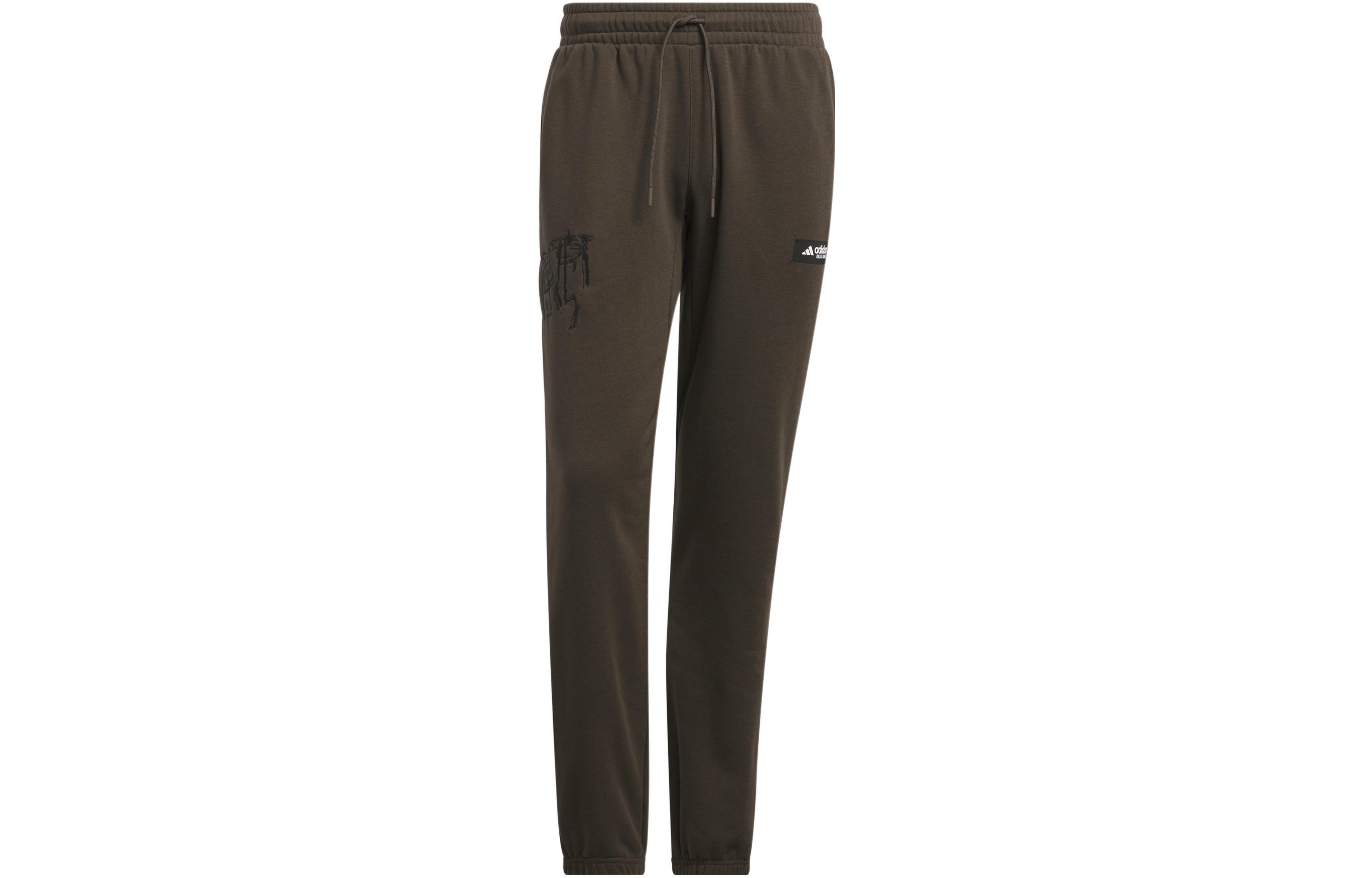 Темно-оливковые трикотажные спортивные брюки Adidas
Темно-оливковые трикотажные спортивные брюки Adidas